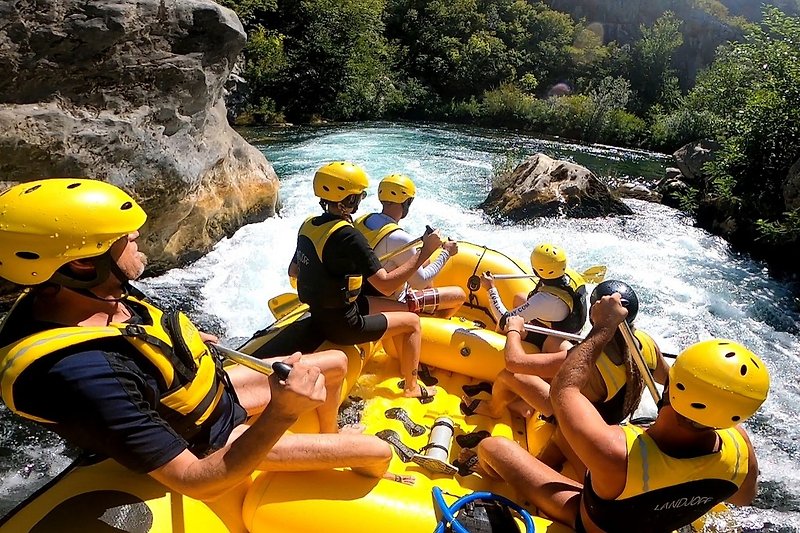 Try rafting on the river Cetina in Omiš...