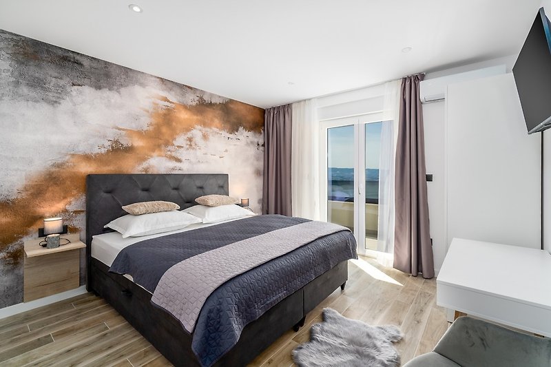 Bedroom No4 with amazing sea views and a huge open terrace with comfortable outdoor furniture