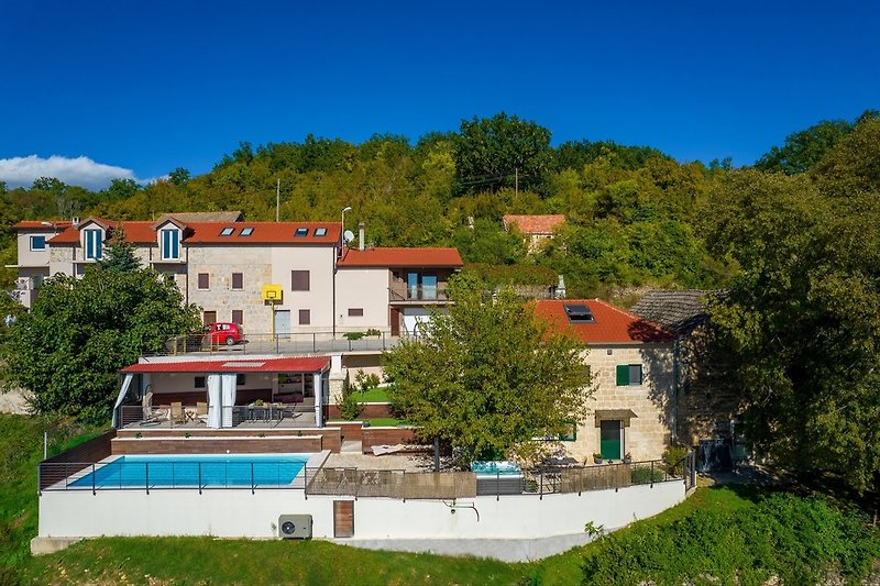 Villa Little Arya is a fully renovated stone villa furnished with vintage style 