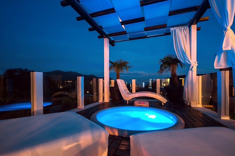 Relaxing lounge area with amazing view and Whirlpool suitable for 4 person