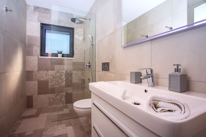 A family Bathroom No3 with shower, first floor