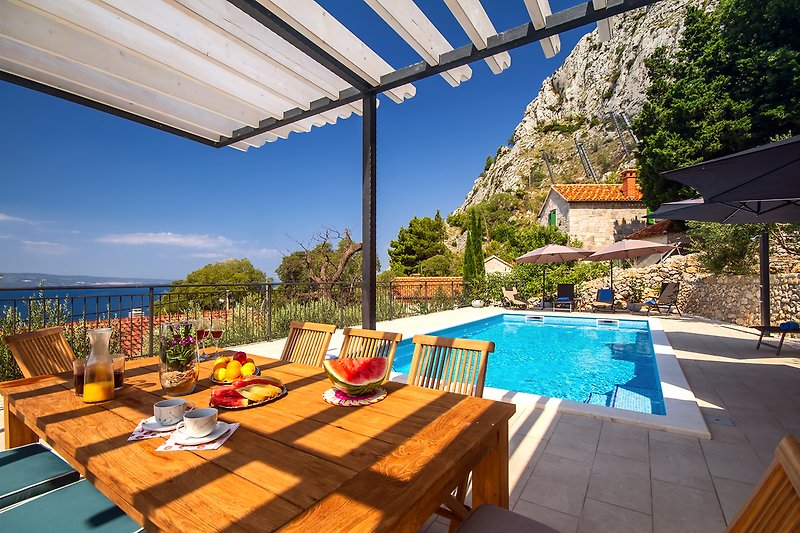 Open sea views from pool area, town Omiš and beautiful mountain environment