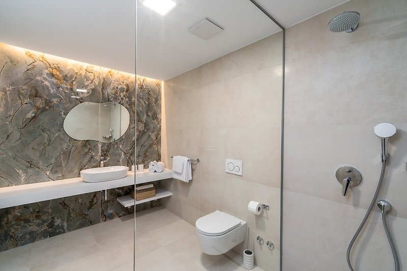 en-suite bathroom with shower (7sqm), a terrace (27sqm) shared with Bedroom No2