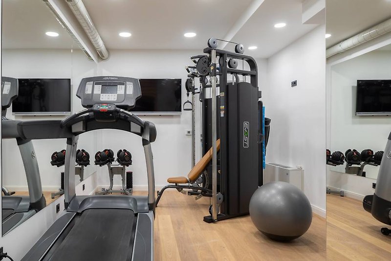 High quality gym equipment next to sauna place at the ground floor