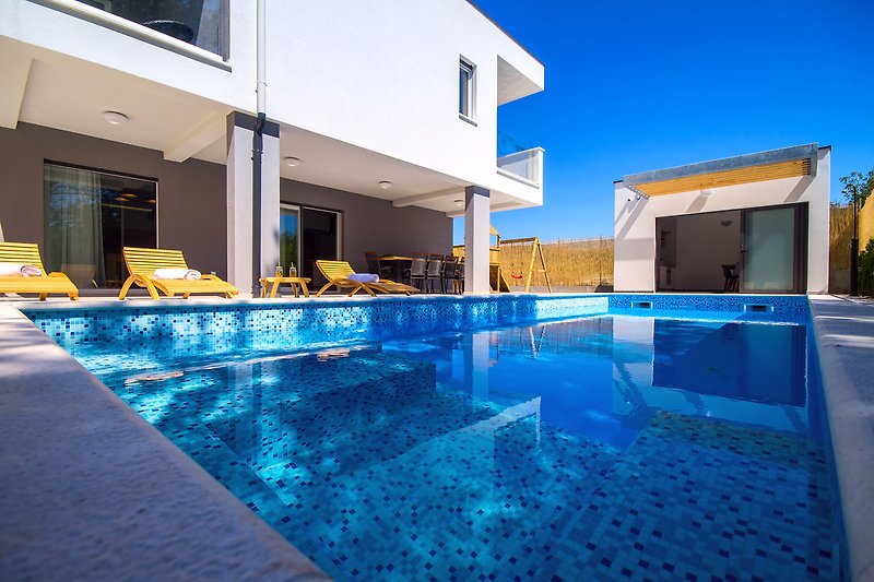 Villa Tela with 33sqm heated pool, attached whirlpool, sauna & summer kitchen
