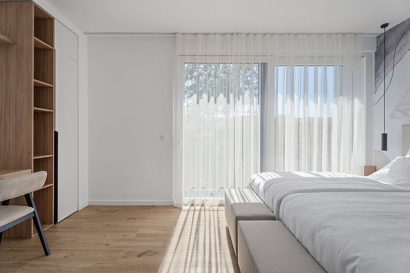 Schlafzimmer Nr. 4 (17 m²) mit zwei Einzelbetten von 90 cm x 200 cm, die zu einem Bett von 180cmx200cm verbunden werden