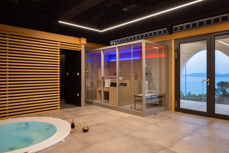 Level 1: The wellness area also offers a beautiful spa zone and contents a Whirlpool for 6 pax, a Finnish sauna, a steam bath cabin.