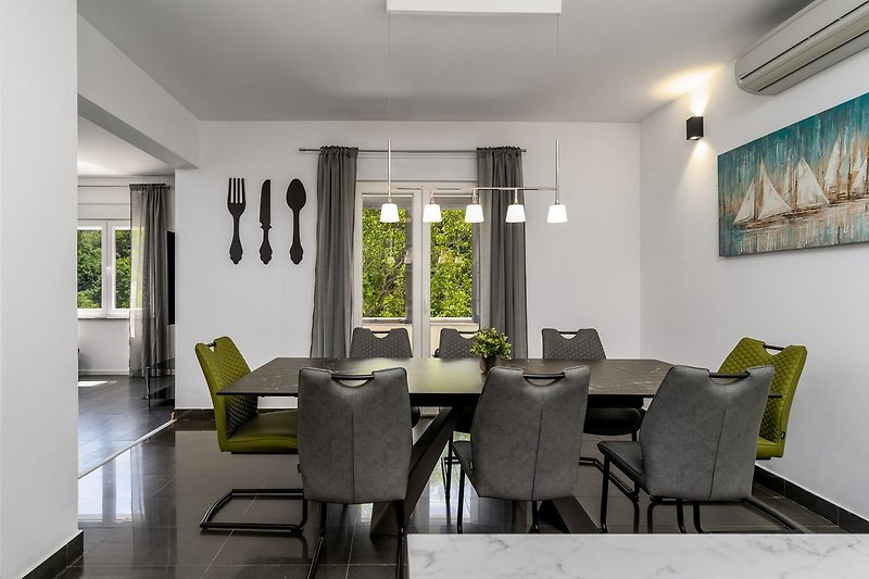 A dining area for 8 people with air-condition