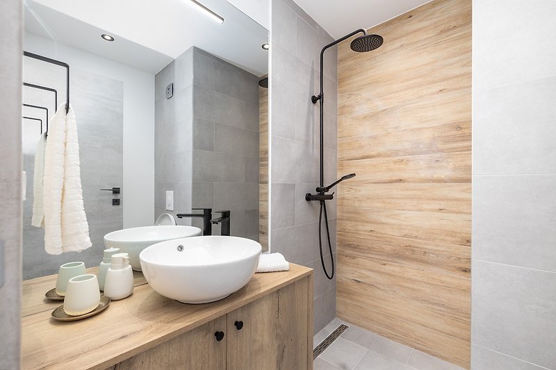 En-suite bathroom with a shower, towels are provided