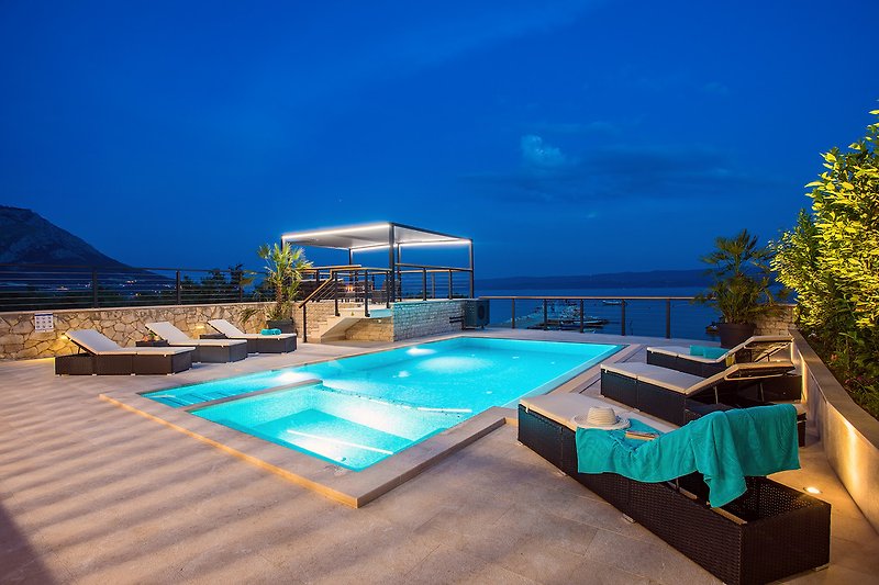 Enjoy the evenings at the pool area while swimming in the private pool