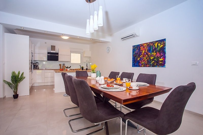 Spacious fully equipped kitchen with a dining area suitable for 8 peopleS