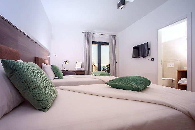 Bedroom No2 with 2 single beds 100cm x 200cm ,TV, en-suite bathroom