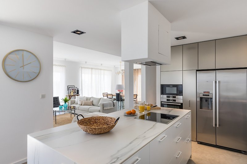 Modern and fully equipped kitchen with all the amenities you might need