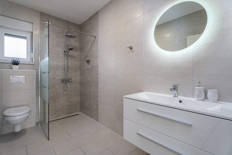 Family bathroom with a shower