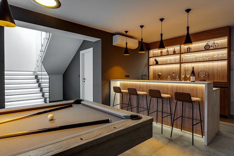 Man cave with billiards, PS4 and bar