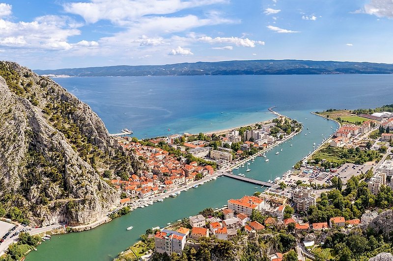Small town Omis with many sandy and pebble beaches