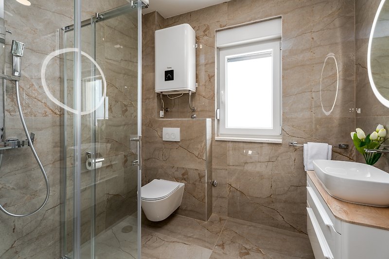 Family bathroom with a shower