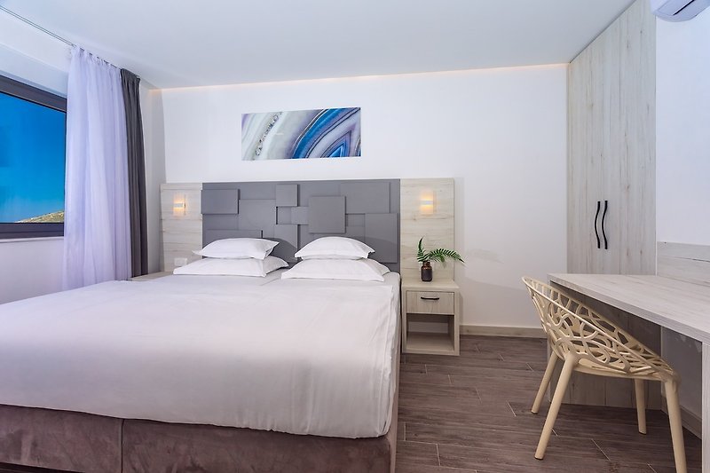 Das Bett im Schlafzimmer Nr. 1 ist 200x210cm groß und kann in 2 Einzelbetten aufgeteilt werden