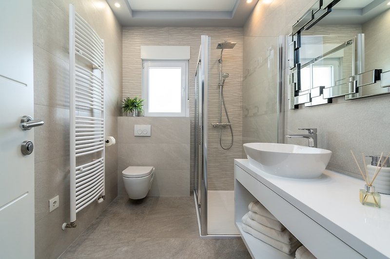 A family Bathroom (5.5sqm) with a shower