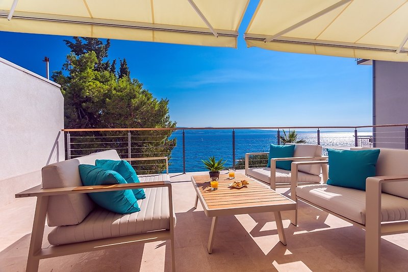 Terrace with a lounge corner (shared with bedroom 2), amazing sea views