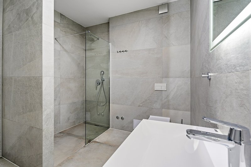 A family Bathroom with a shower