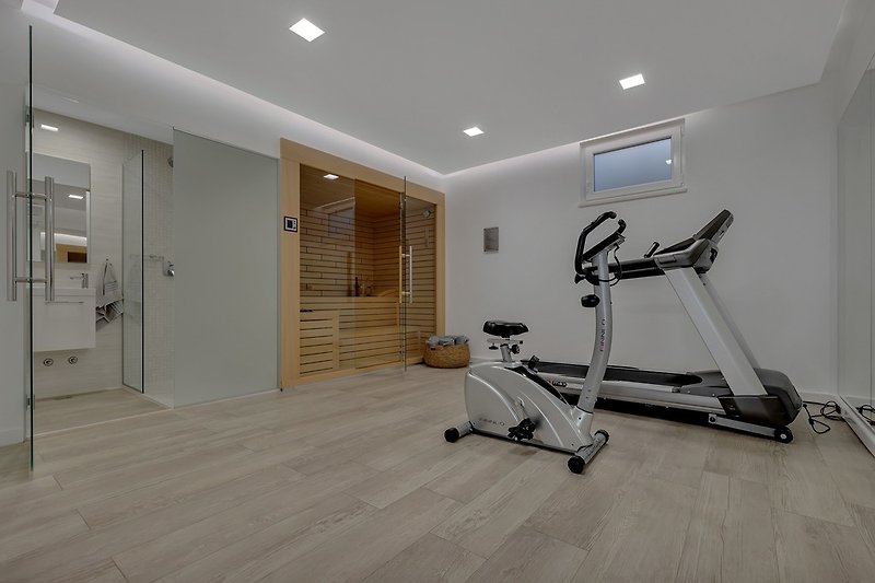 There is also an air conditioned and professionally equipped Gym with a treadmill, exercise bike, weights, a Finnish sauna,familiy bathroom