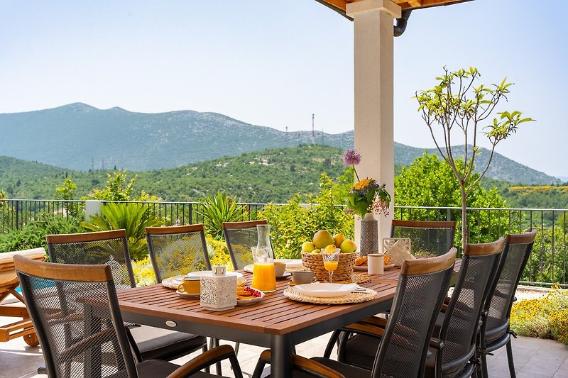 Outdoor dining table, with magnificent views of the landscape.
