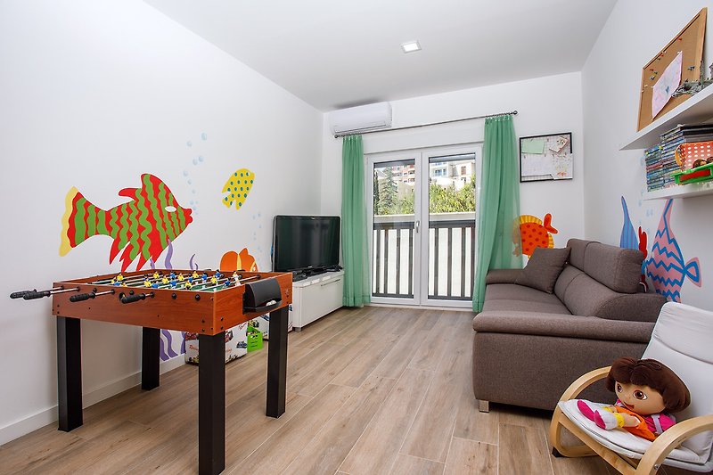 Playroom on 1st floor, 2 sofa beds, toys and fun details for children all ages