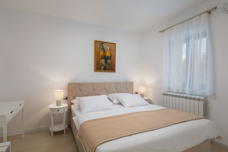 Schlafzimmer Nr. 5 mit einem Doppelbett 180 cm x 200 cm, Klimaanlage