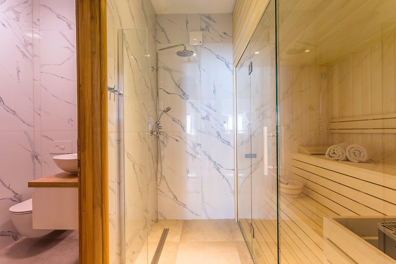 Ground floor with Finish sauna with a shower 