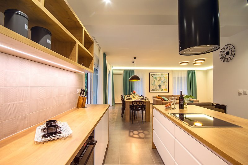 Fully equipped kitchen with all amenities you might need for comfortable stay