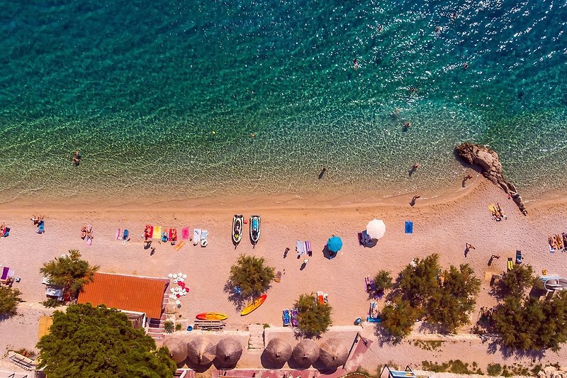 You can take a short 5-min drive to explore the pebble beaches in the Omiš area.