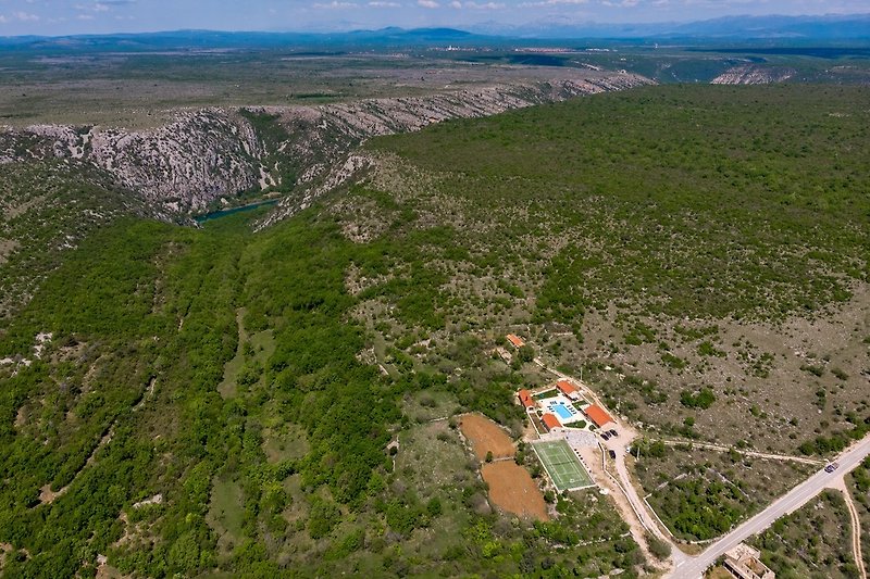 Villa is settled in a very quiet area near Krka waterfalls on a land plot of 3500m sqm