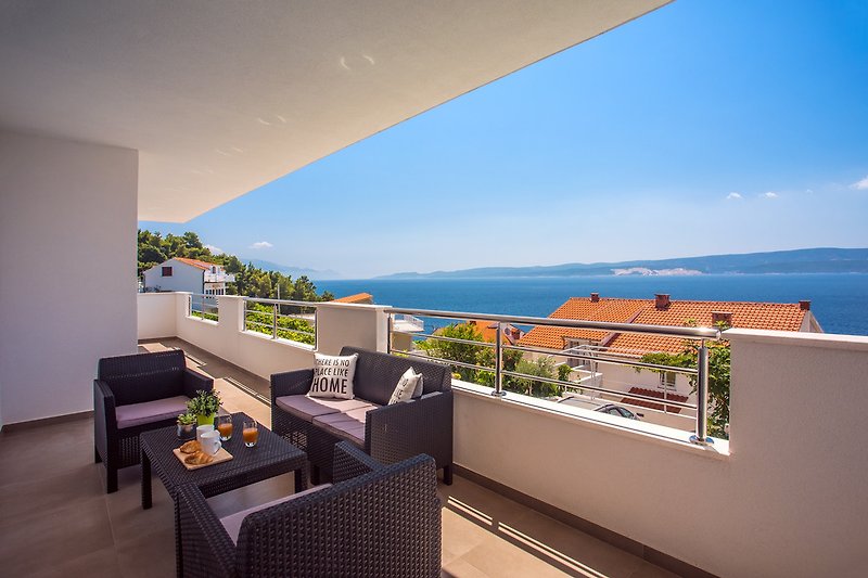 Terrace on 1st floor with outdoor furniture, open sea view
