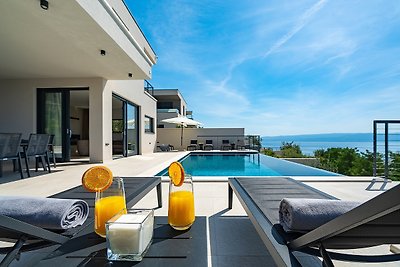 NEW! Stylish Villa Olea with heated pool and panoramic sea views