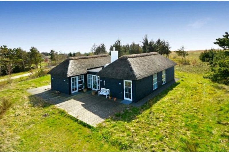 Architectenhuis met zeezicht aan de Ringkøbing Fjord