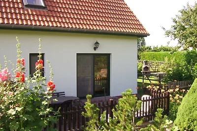 Casa di campagna vicino allo stagno FeWo rosso