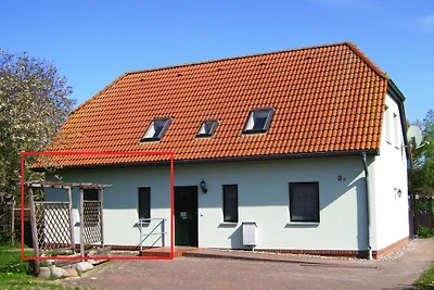 Casa di campagna vicino allo stagno FeWo rosso