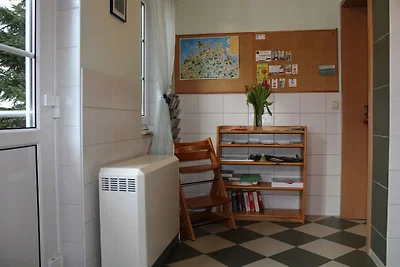 Casa di campagna vicino allo stagno FeWo rosso