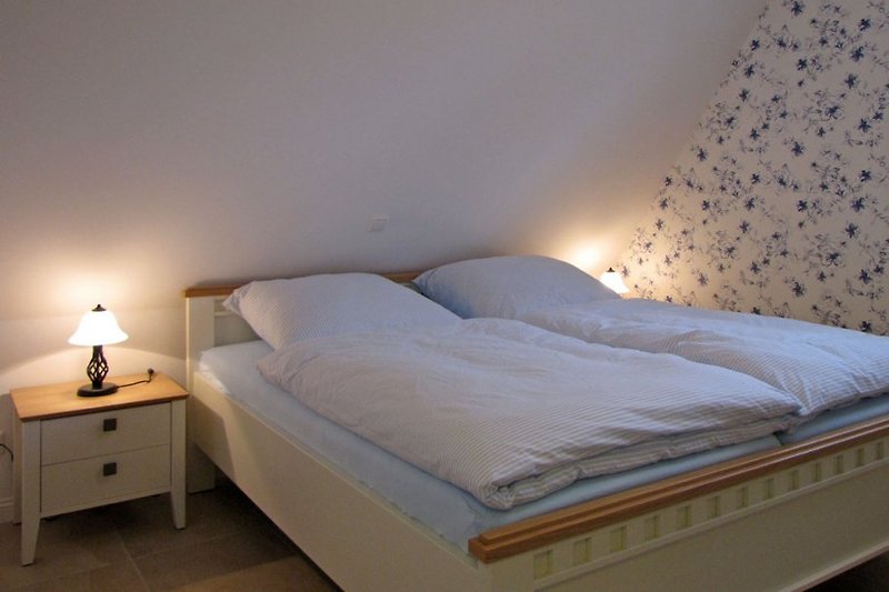 1. Chambre à coucher avec lits doubles