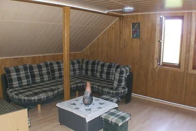Tilla kinderfreundliches Holzhaus