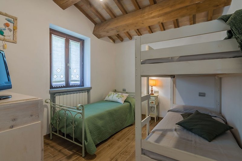 Villa Petra - room with three beds