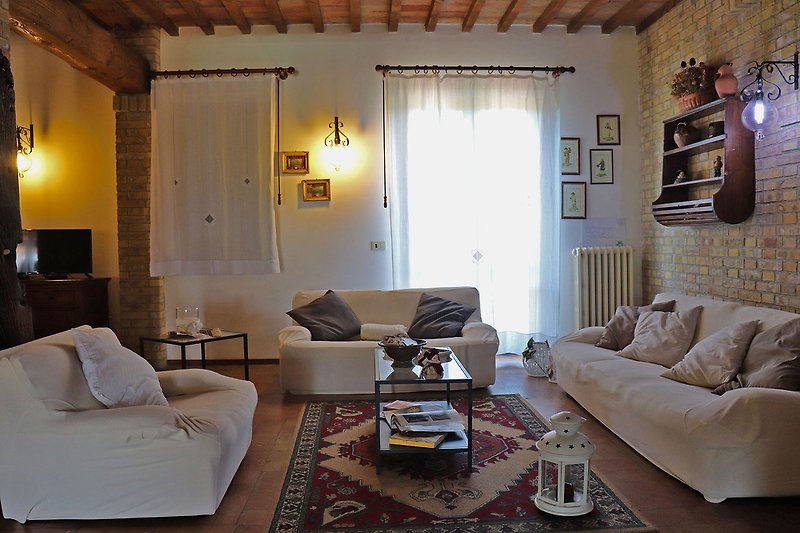 Villa Monica - Wide living room with sitting area, fireplace and pool table