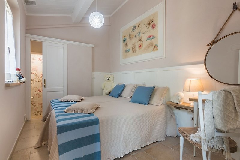 Casa Emanuela - Bedroom with two single beds