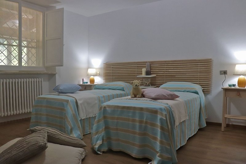 Villa Luisa- Schlafzimmer mit zwei Einzelbetten