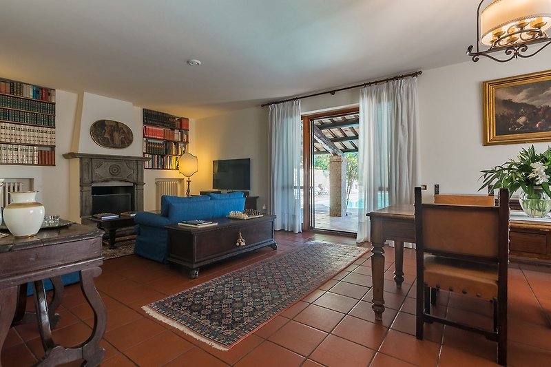 Villa Panorama - Living room with direct access to the porch and swimming pool area
