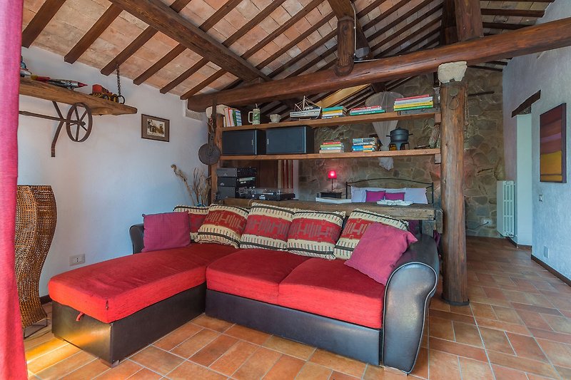 Casa Infinito – Offener Raum mit Sofa