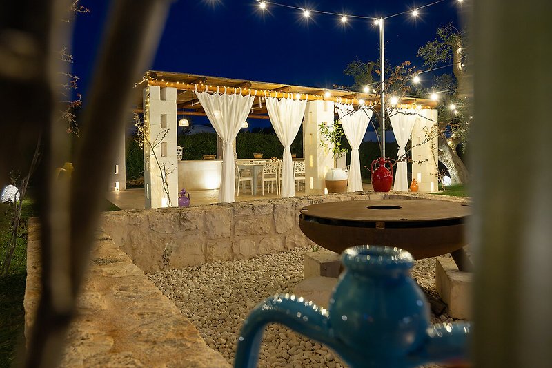 Trulli Le Pupe - Relaxation area with brazier for pleasant evenings under the stars