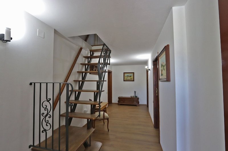 Villa Luisa- Treppe in den ersten Stock