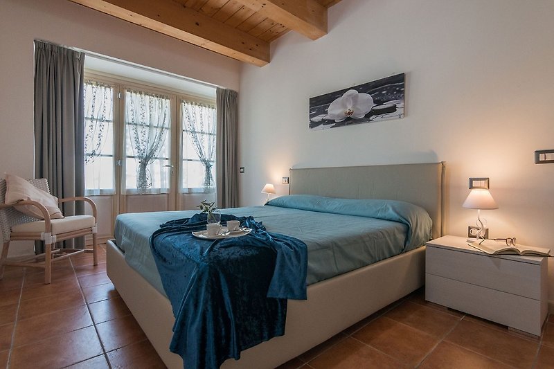 Villa Rosa - Schlafzimmer mit Doppelbett
